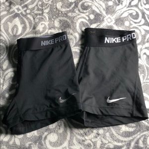 Two pairs of Nike Pro spandex shorts